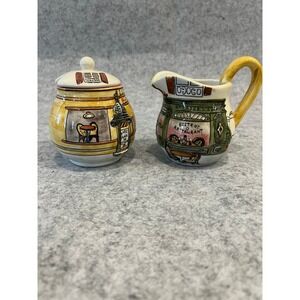 Sakura Warren Kimble Bistro Scenes Hand Painted Creamer and Covered Sugar Set